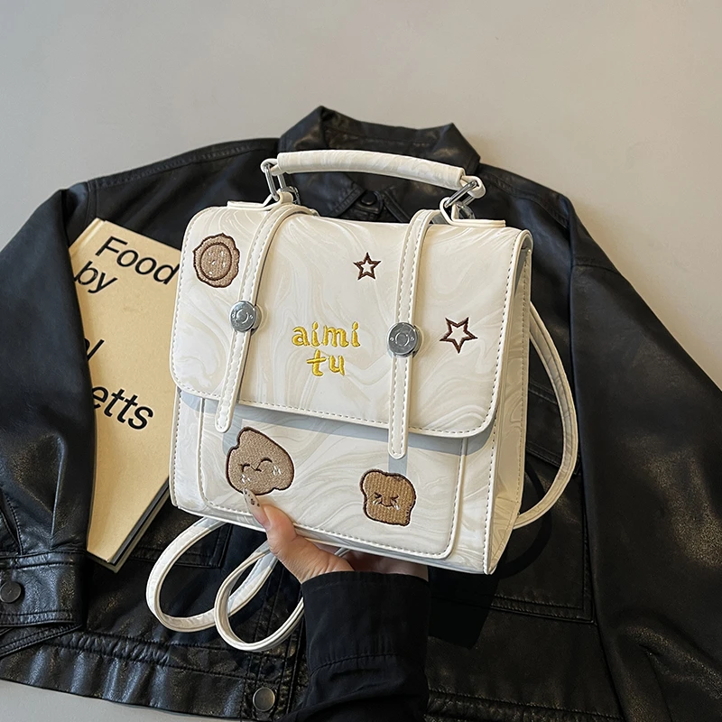 艾米兔 X COOLE女包2025新款百搭洋气潮流手提包简约可爱双肩包