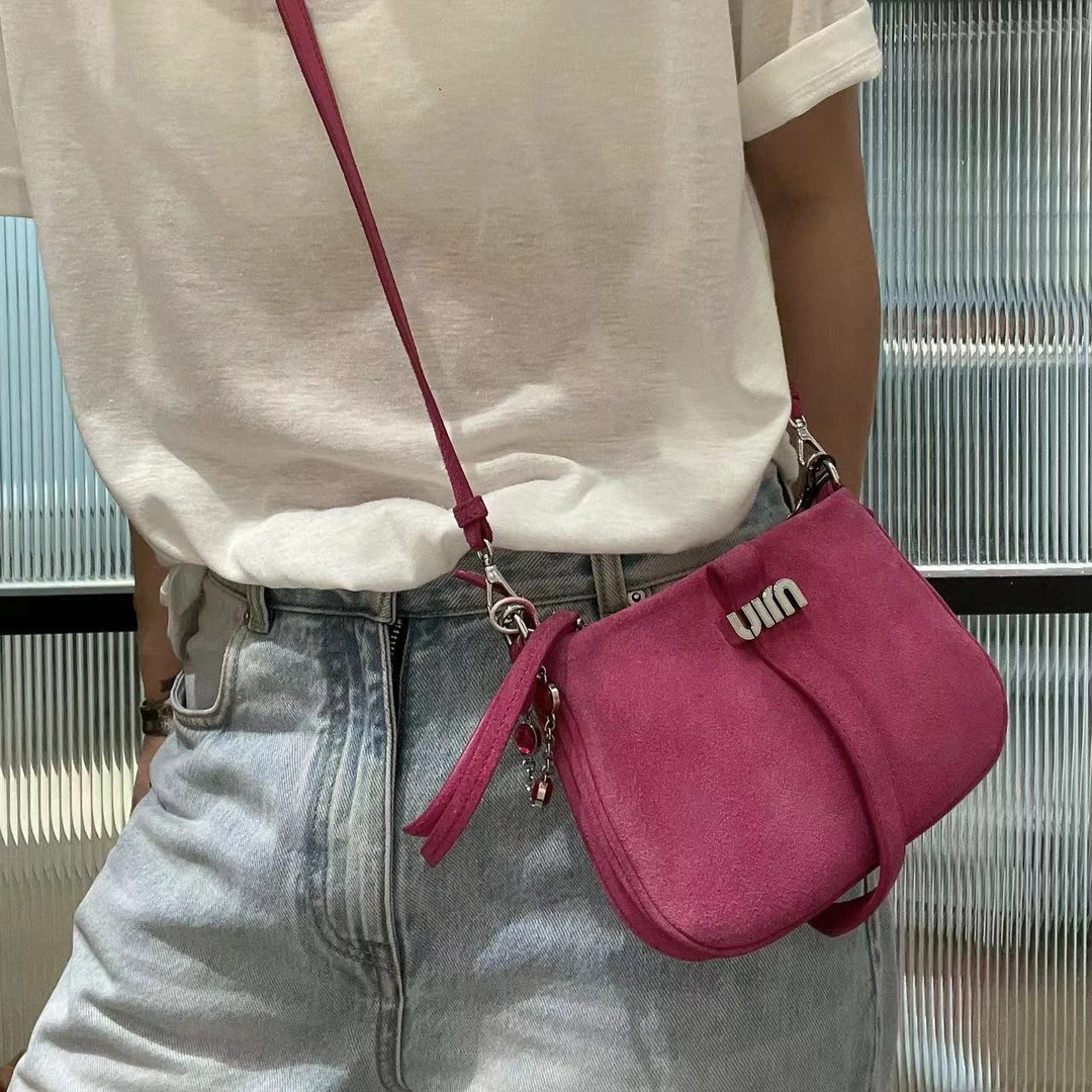 95新 MIU MIU/缪缪 NN0726 粉红色小斜挎包