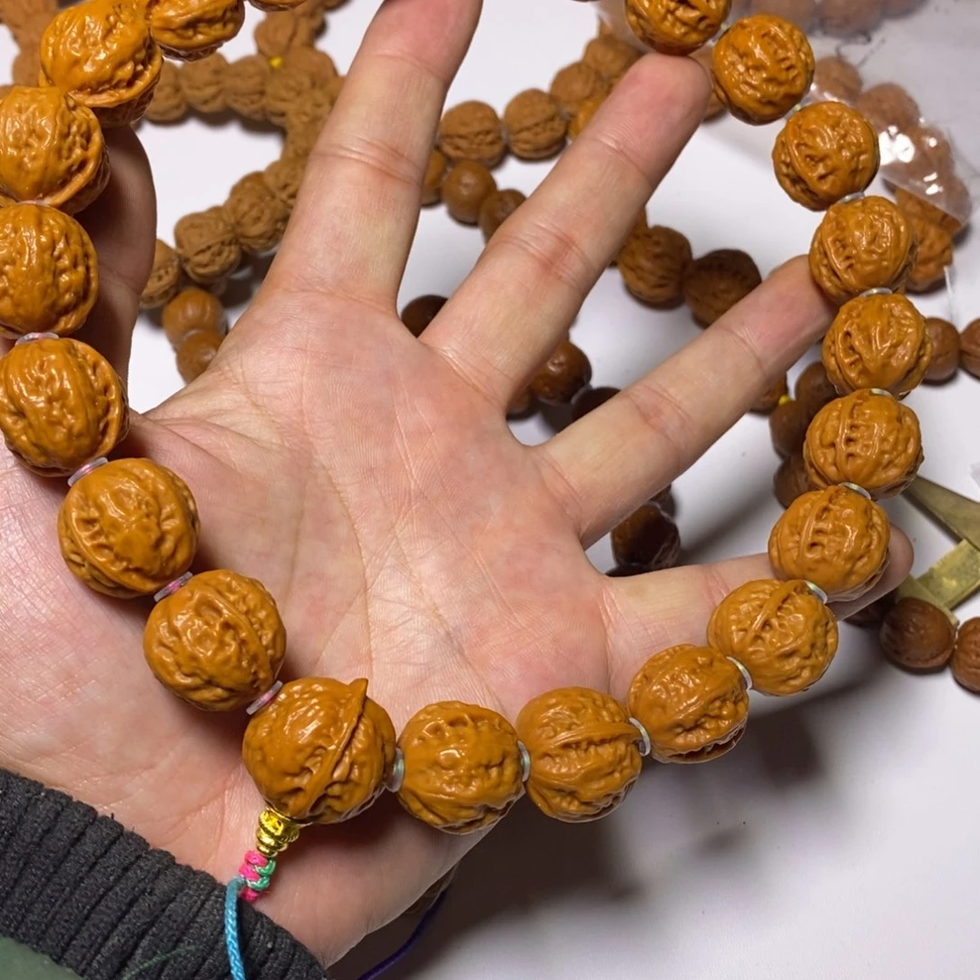 桃核手串18.5粗筋蚂蚁