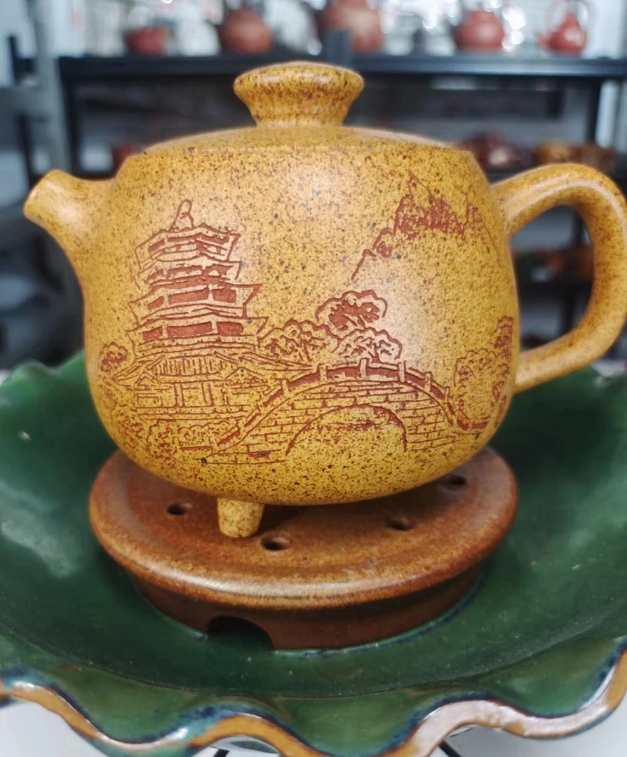 宜兴丁蜀镇高端精美刻绘宝塔三足紫砂壶