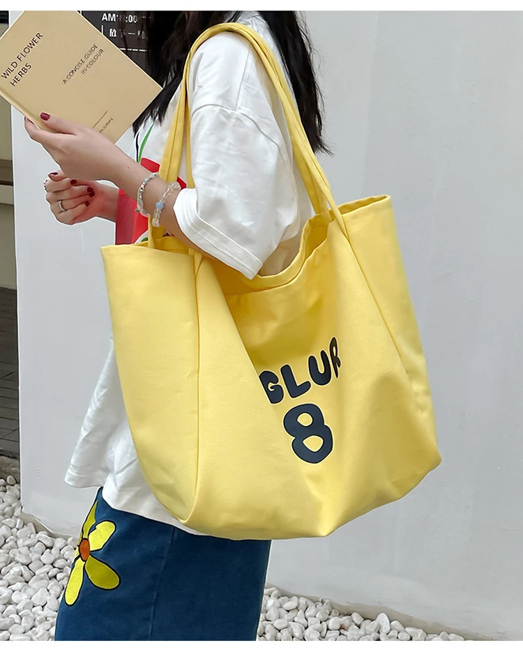 时尚百搭帆布包休闲夏季单肩包小清新小众大学生纯色印花ins潮流