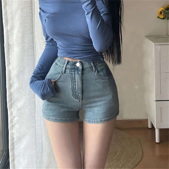 自带高腰丰胯垫~丰跨牛仔短裤女夏季新款复古浅蓝a字弹力包臀短裤
