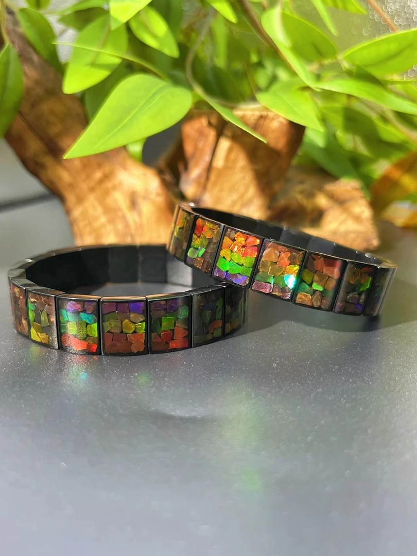 【大美】加拿大斑彩石手排  居明.李