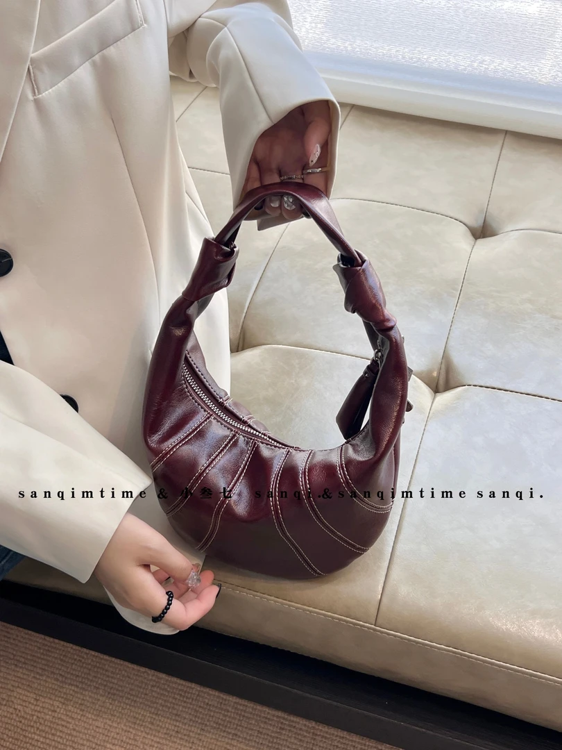 安可拉红 2024新款时尚绣线牛角斜挎包2625