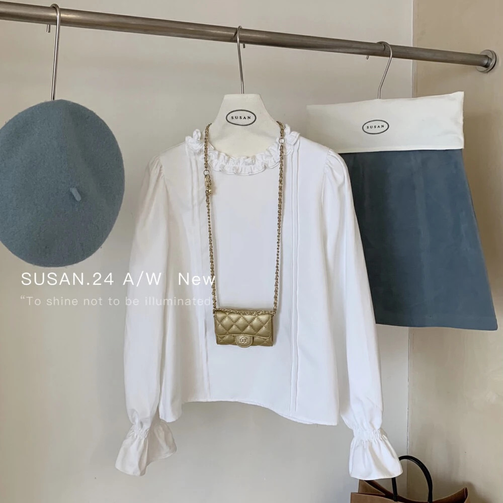 韩系木耳边重工净色衬衫女春秋设计感泡泡袖显瘦百搭长袖上衣2025