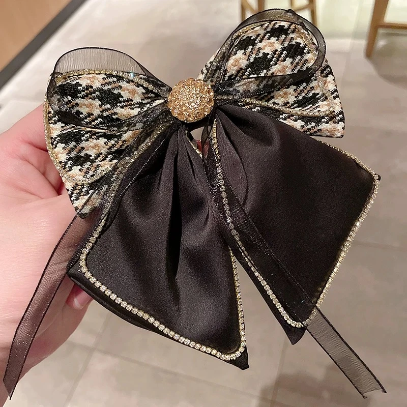 2024年新款蝴蝶结格子头饰品弹簧夹复古气质半扎发夹发饰A168.