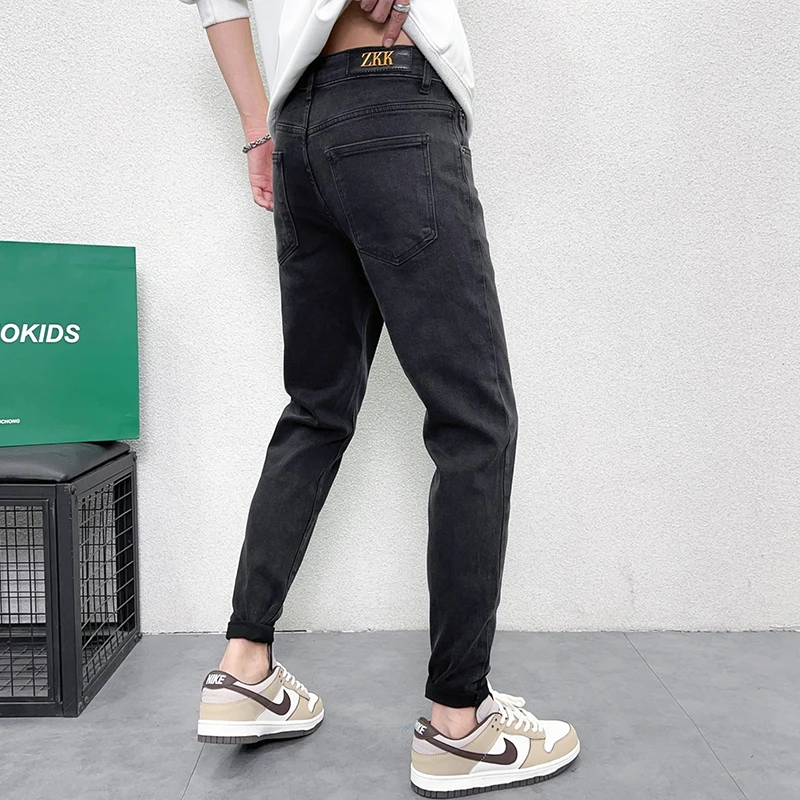 高档牛仔裤男秋冬款黑灰色修身显瘦简约休闲时尚帅气百搭小脚长裤