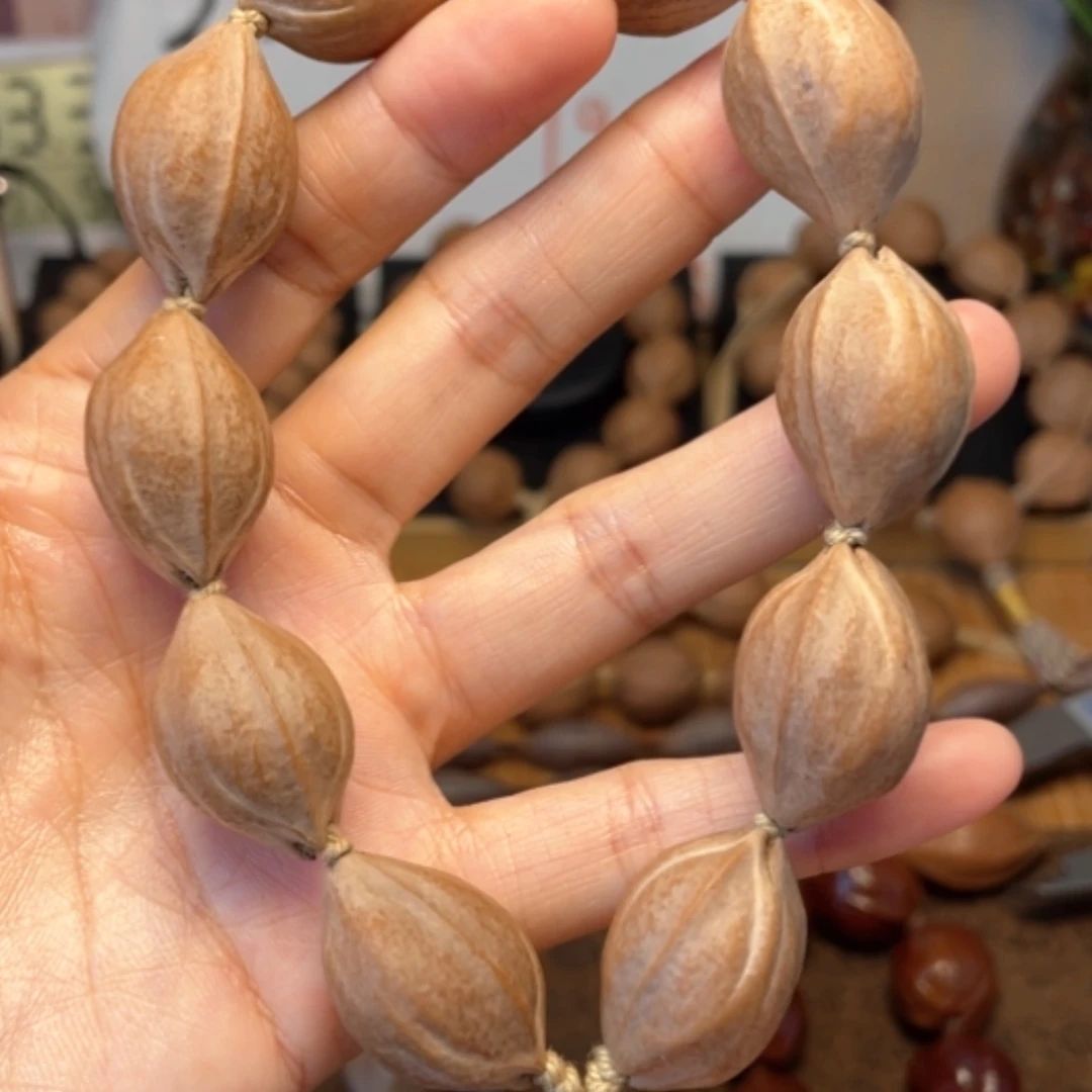【闪购商品】橄榄核核雕梅林铁核1.8*2.6手串