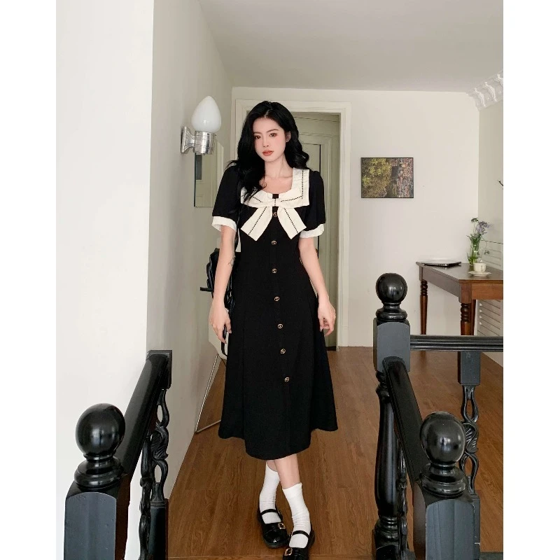 A342大码梨型身材显瘦胖mm小黑裙方领蝴蝶结装饰连衣裙2025年夏季