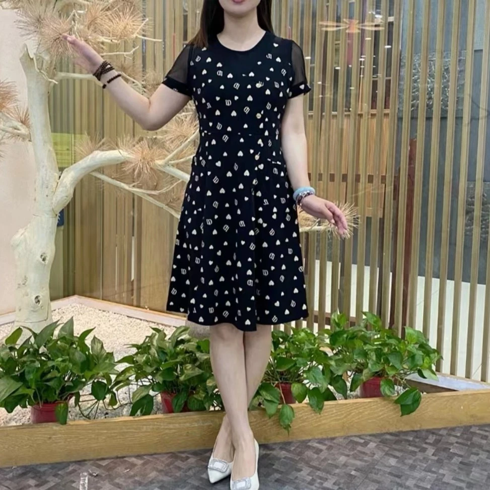 夏季新款时尚短袖印花拼接显瘦气质减龄圆领连衣裙微胖大码碎花