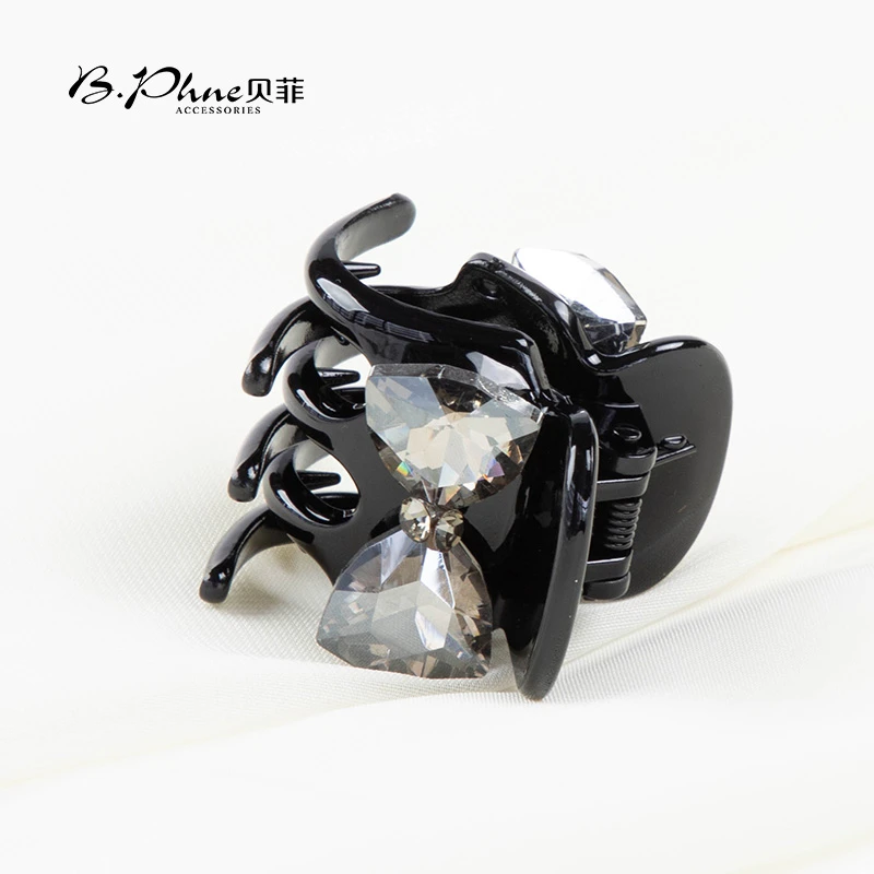 B.【贝菲】马尾夹时尚蝴蝶结满钻