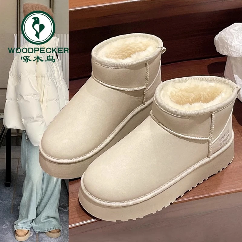 啄木鸟白色雪地靴女冬2025新款防水皮面厚底短筒加绒加厚保暖棉鞋