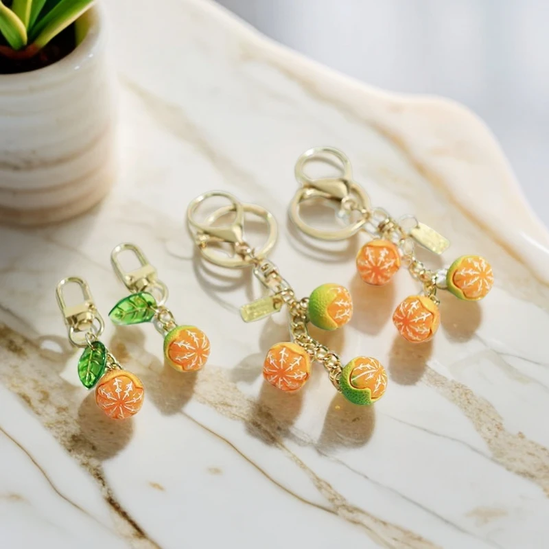 新款简约小橘子钥匙扣挂件仿真立体桔子耳机套挂件学生小礼物挂件