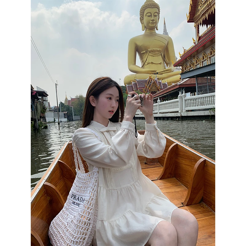 肉完初春穿搭奶杏色甜美桔梗法式浪漫优雅蝴蝶结连衣裙女春秋短款