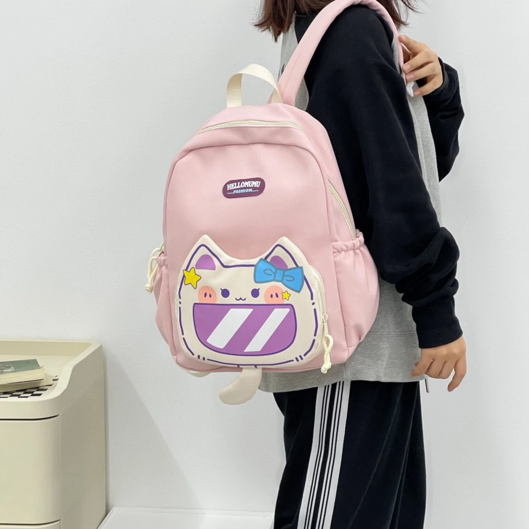 新款猫咪小学生书包休闲简约轻便书包超萌可爱书包户外出游背包