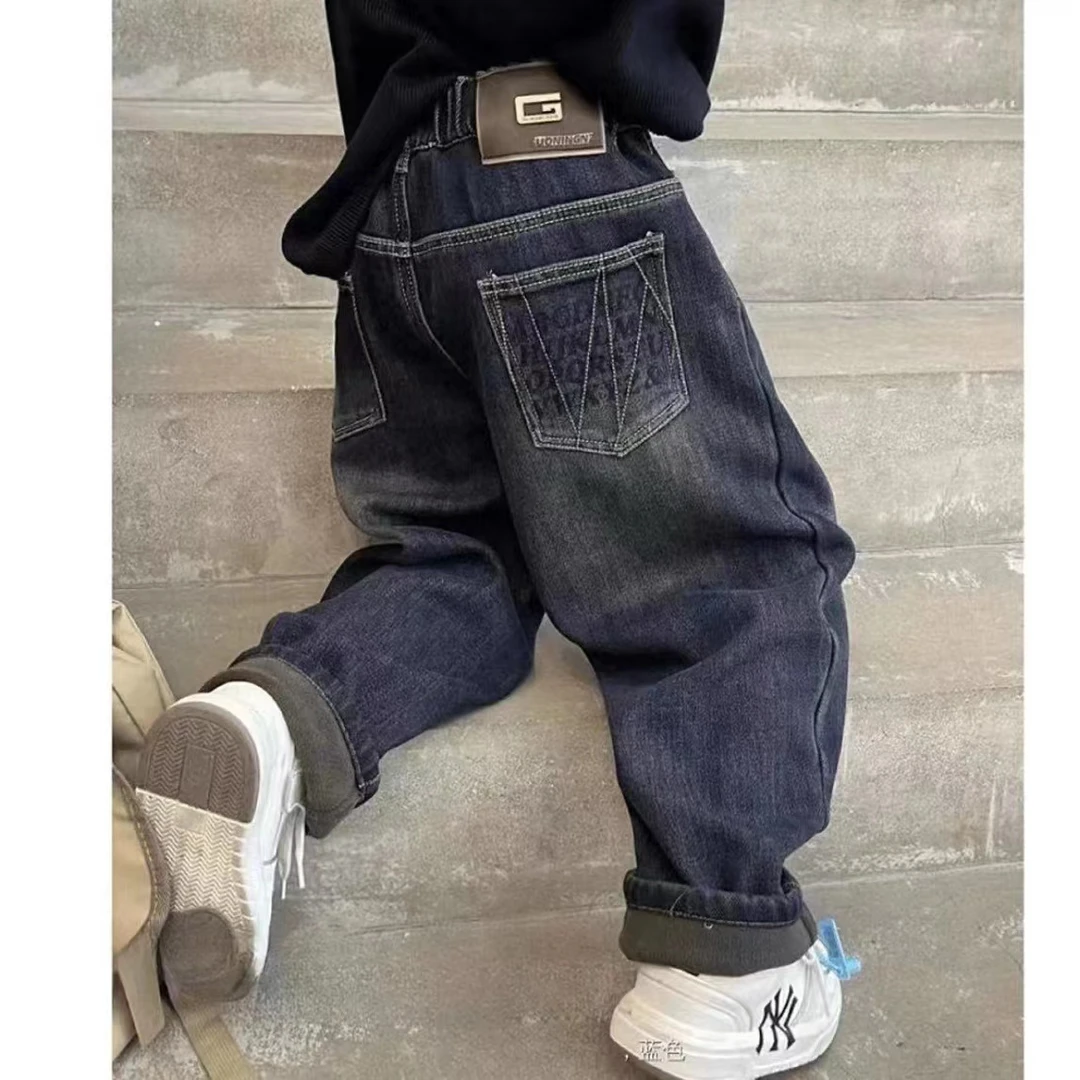 Q111秋冬儿童新款后袋G字皮标一体绒牛仔裤