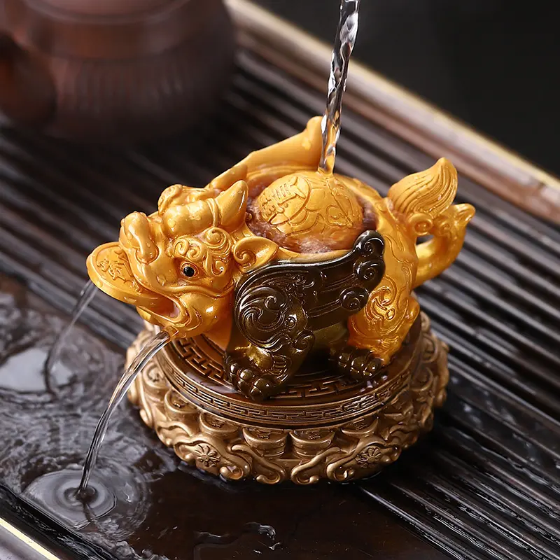 Rotating Color-Changing Pixiu Tea Pet on a tray