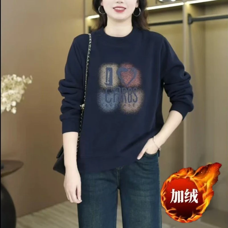 冬季新款加绒加厚下摆开叉上衣女休闲显瘦遮肚圆领纯色卫衣