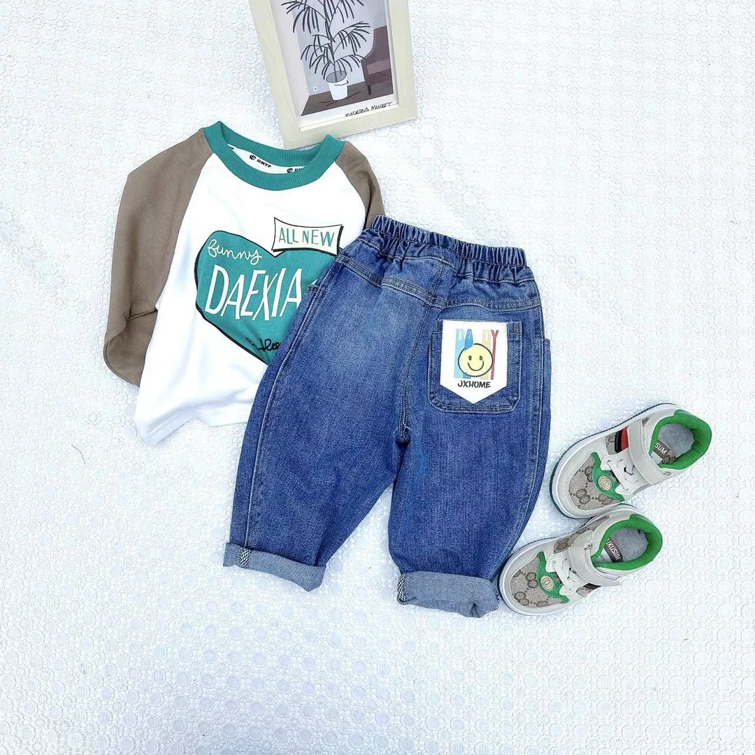 K23125  韩版  童装  笑脸贴标 百搭 牛仔裤