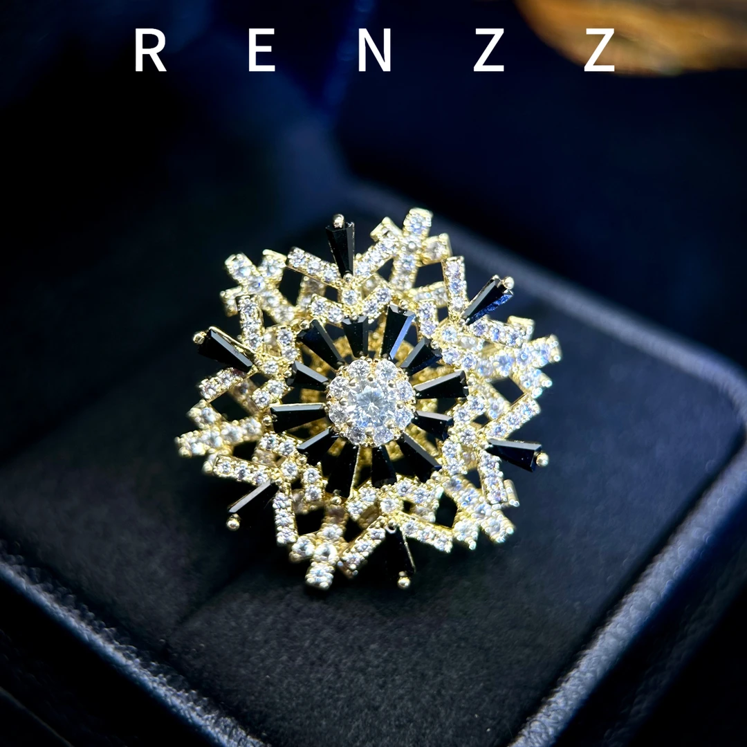 7643黄底黑色旋转雪花胸针