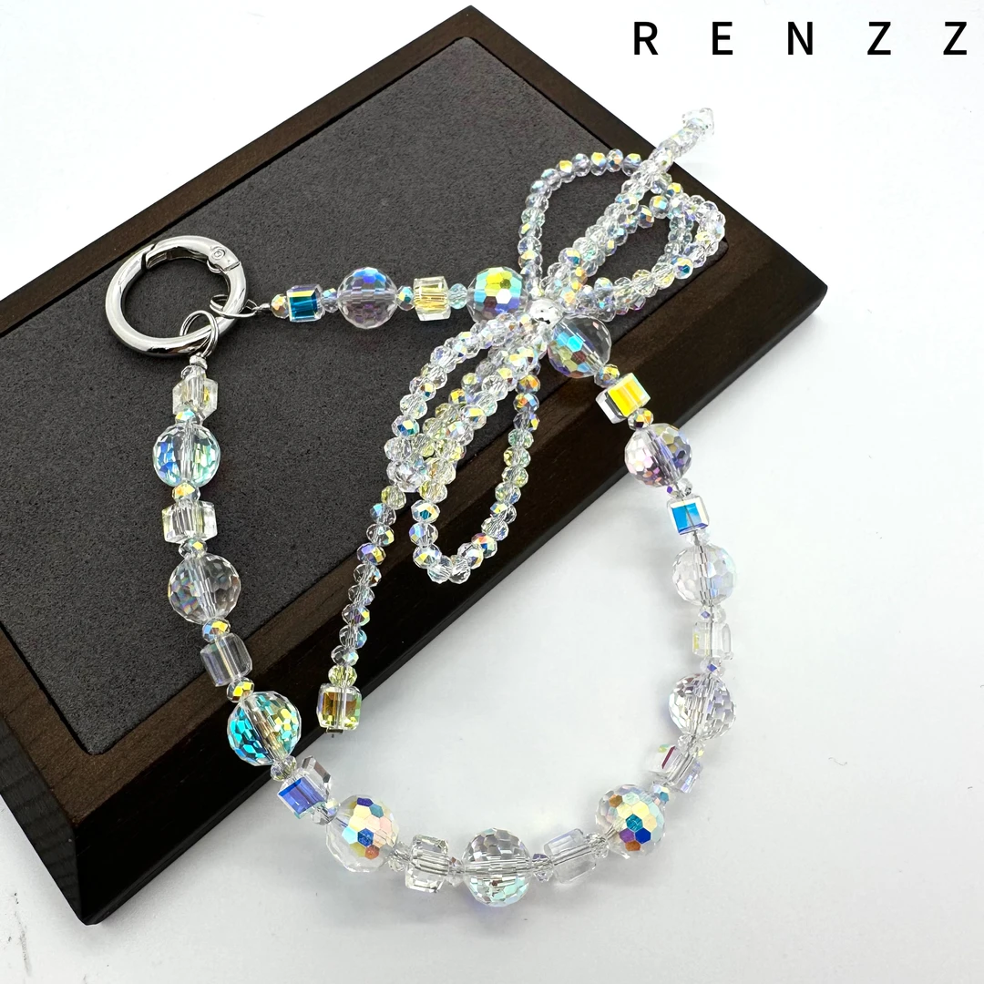 7583白色炫彩蝴蝶结手机链