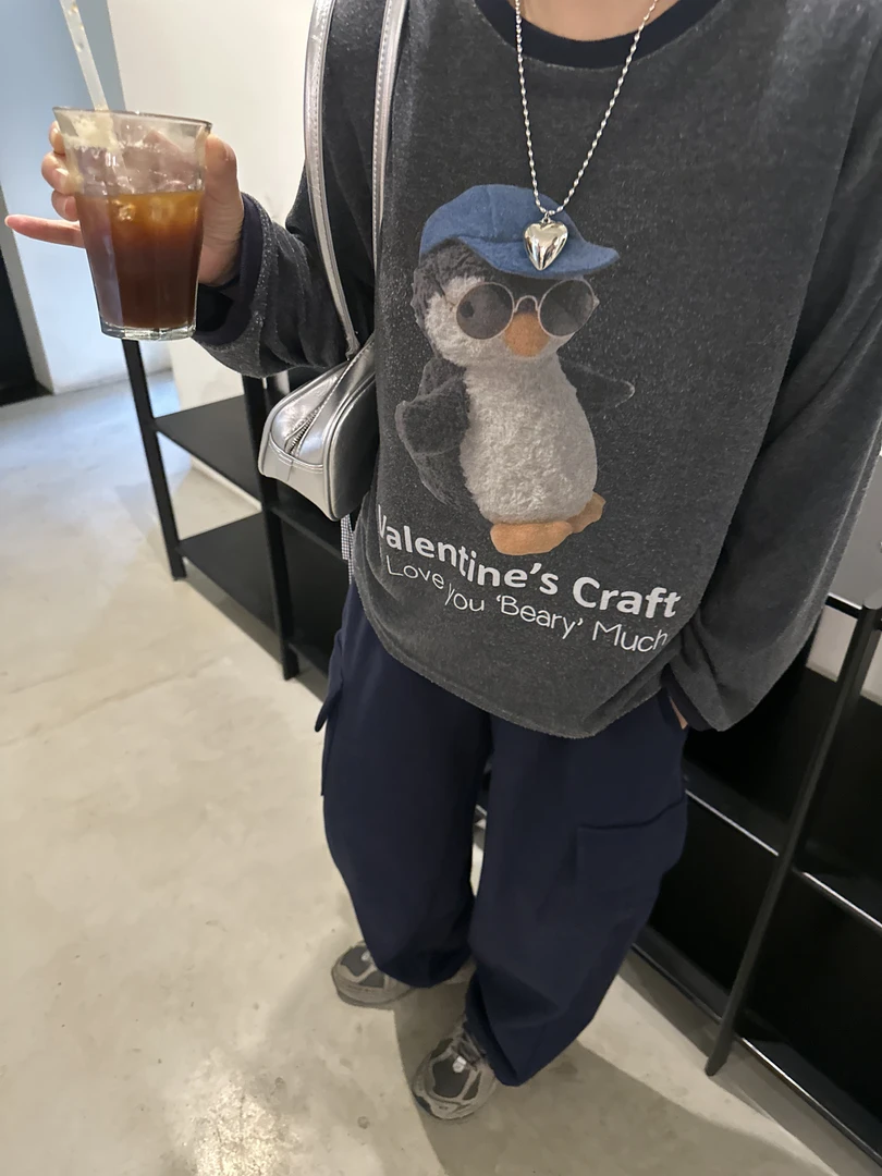 韩国东大门设计师UN家秋款女时尚拼色磨毛卡通企鹅印花宽松长袖