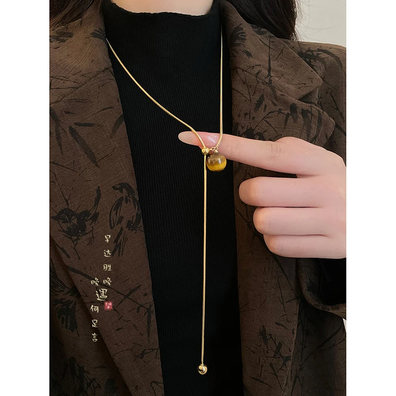 钛钢项链真金电镀人造虎眼石流苏项链轻奢高级感长款毛衣链复古项