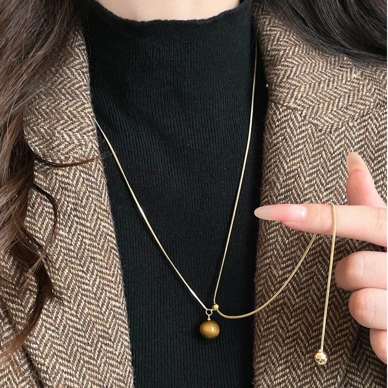 钛钢项链 秋冬轻奢雅丹风珠珠毛衣链女百搭可调节毛衣链颈链