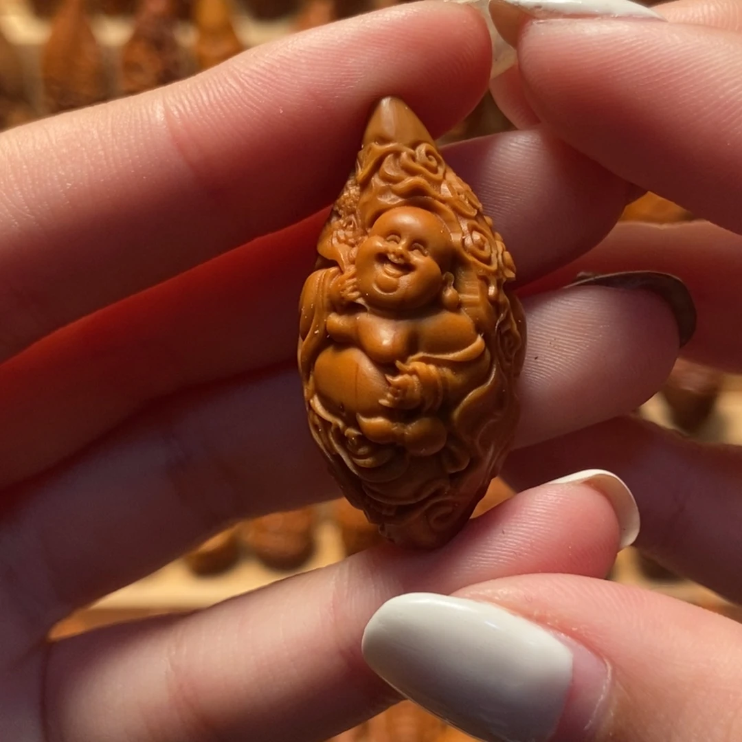 橄榄核核雕双面财迷 瑶