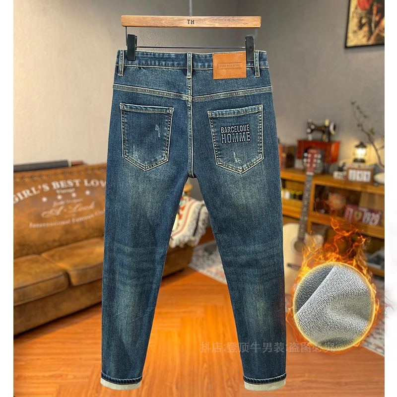 冬季高端加厚薄绒蓝色九分牛仔裤男百搭弹力修身小脚柔软质感长裤