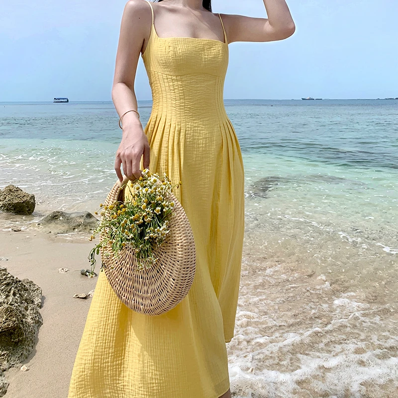 小众别致黄色露背绑带吊带性感连衣裙海边度假长裙收腰及踝沙滩裙