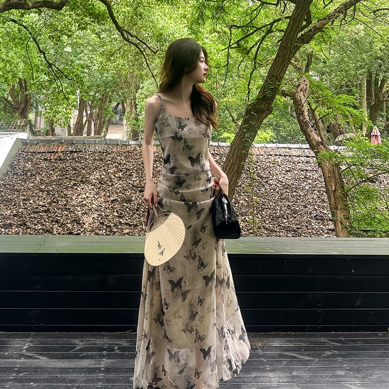 清冷水墨蝴蝶印花连衣裙女2025夏季新款法式绝美超仙海边度假长裙