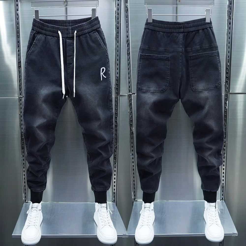 2025春季韩版新款男牛仔裤休闲潮流修身小束脚黑灰色弹力腰哈伦裤