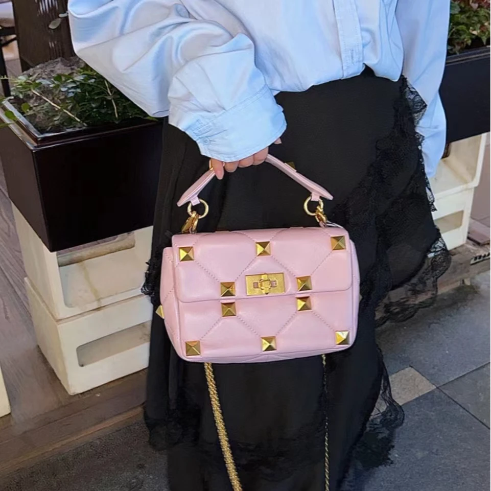 95新 Valentino/华伦天奴 CS4929/粉金铆钉/斜挎包