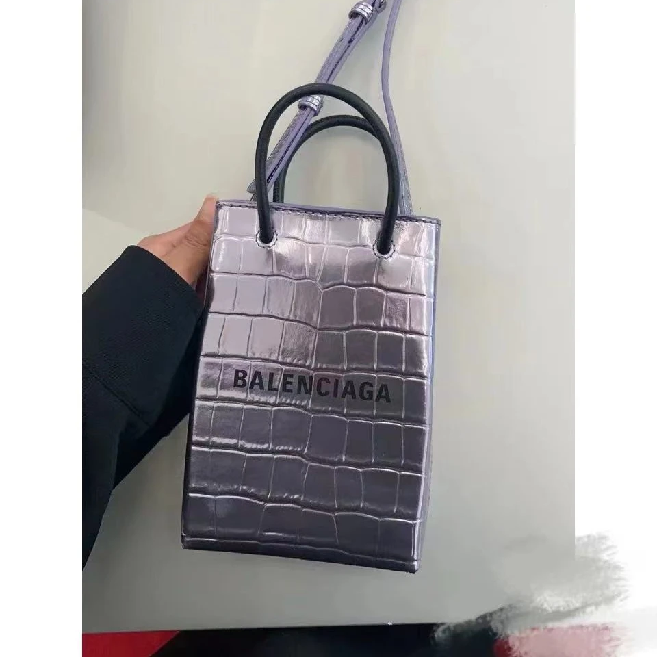 95新 Balenciaga/巴黎世家 坤球奢选 巴黎世家电镀紫手机斜挎包