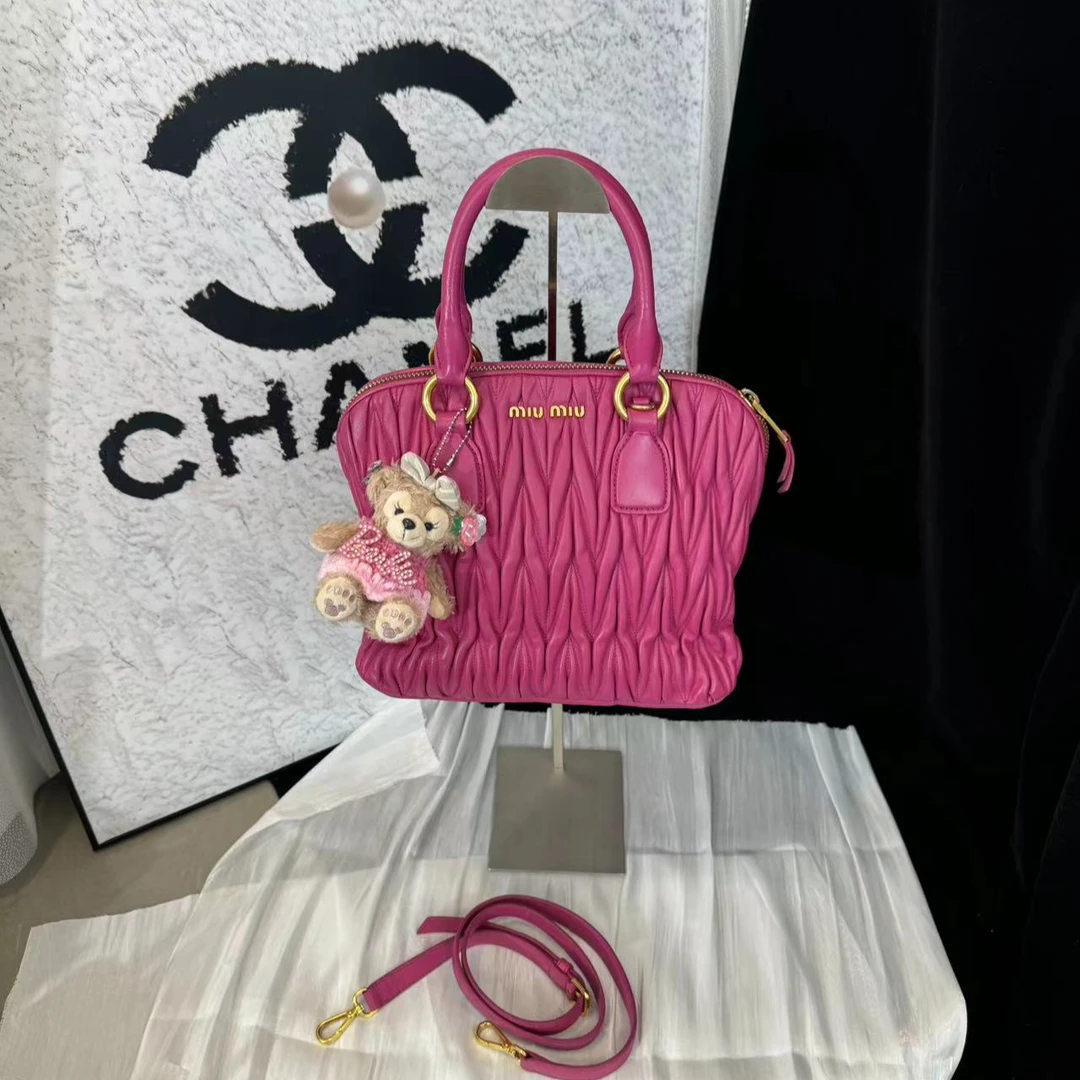95新 MIU MIU/缪缪 坤球奢选 缪缪粉色手提单肩包