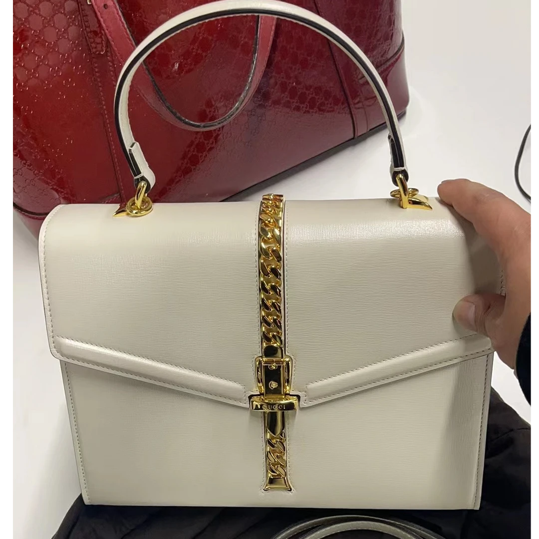 99新 GUCCI/古驰 sylvie1969手提斜挎包 /BG23003368/98