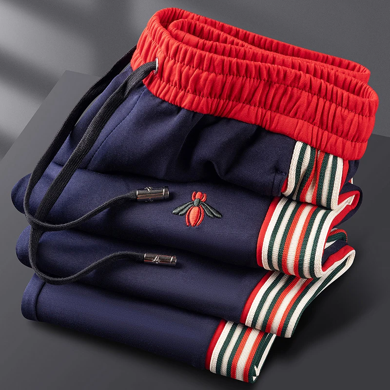 轻奢秋冬时尚撞色侧边织带运动裤男小脚高端刺绣太空棉直筒卫裤男