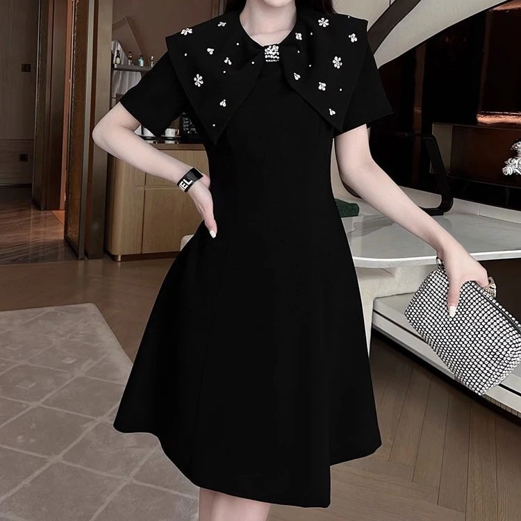 赫本小香风黑色连衣裙女2024年夏季新款法式名媛收腰显瘦中长裙子