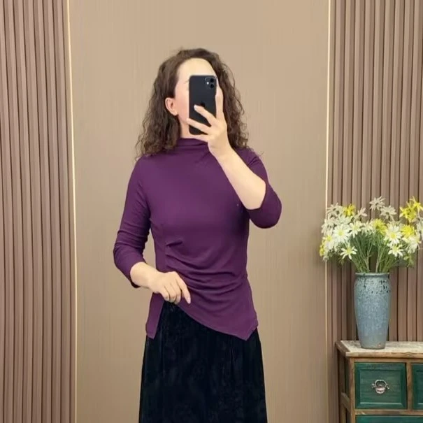 希木 >高领不规则气质开叉秋款中袖2023新款火爆显瘦遮肉微弹上衣