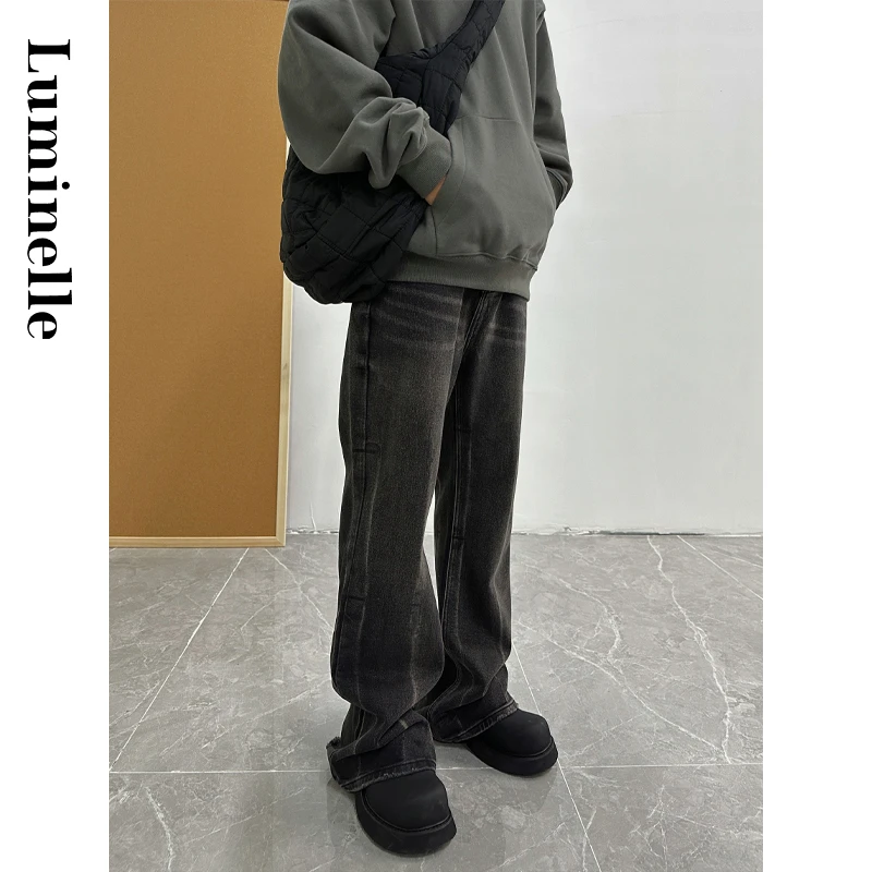 做旧水洗黑灰拖地喇叭宽松破坏牛仔裤巴黎牛王微喇裤子