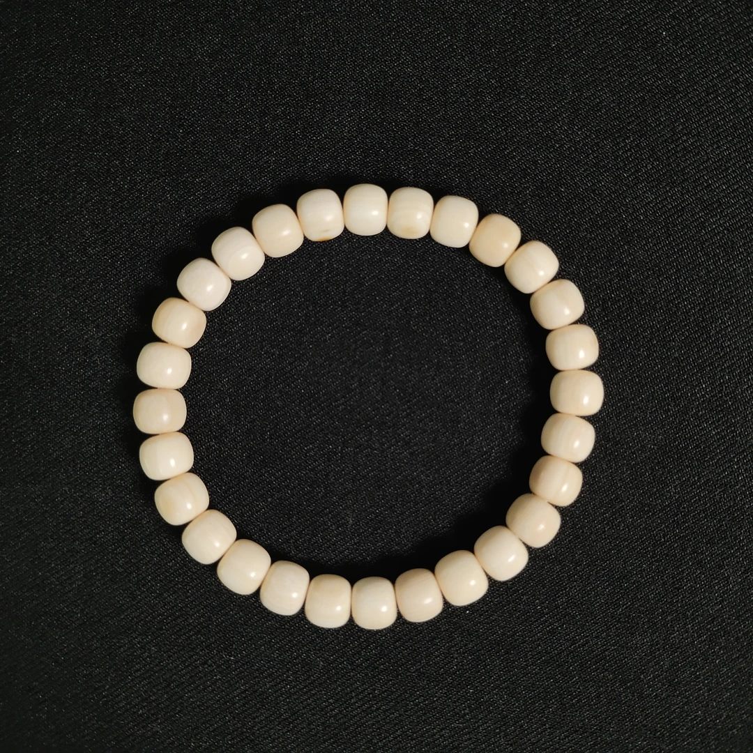 D111009 只做天然猛犸牙 带皮老型珠单圈 直径8X对孔7mm