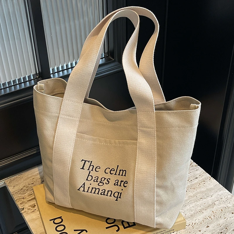 原创自制加厚帆布休闲托特简约百搭文艺学生通勤便携手提包袋女