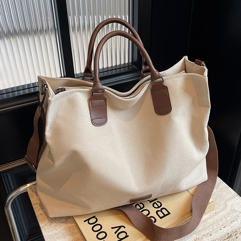 大容量包包女2025新款帆布手提单肩斜挎通勤包休闲百搭上课托特包