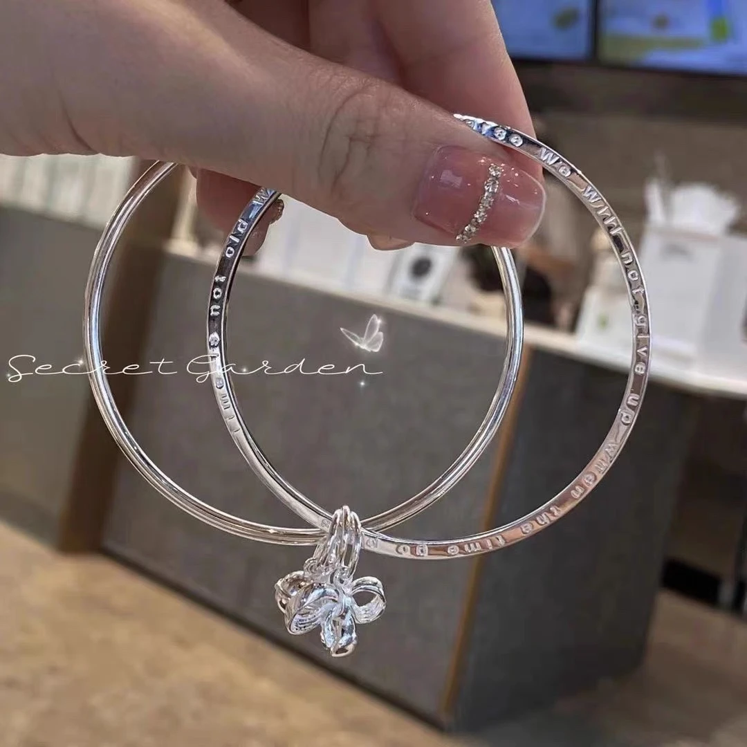 足银手镯 双环在逃公主蝴蝶结999纯银铃铛实心手镯女时尚气质手环