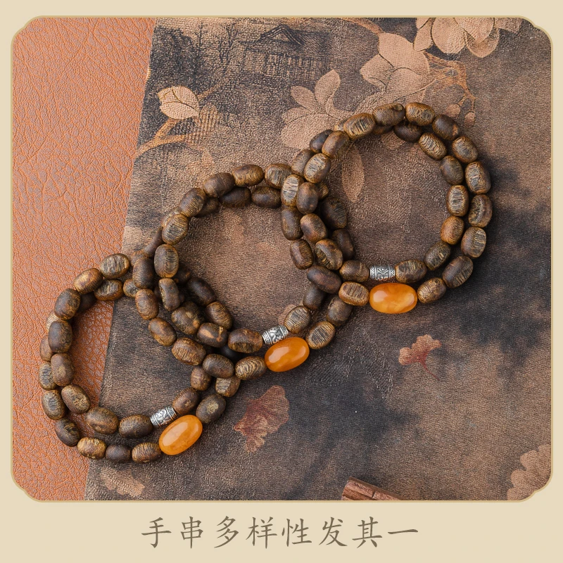 XIANYUAN/仙源莺歌绿奇楠随形瘤疤珠蜜蜡双圈手串多样性发其一