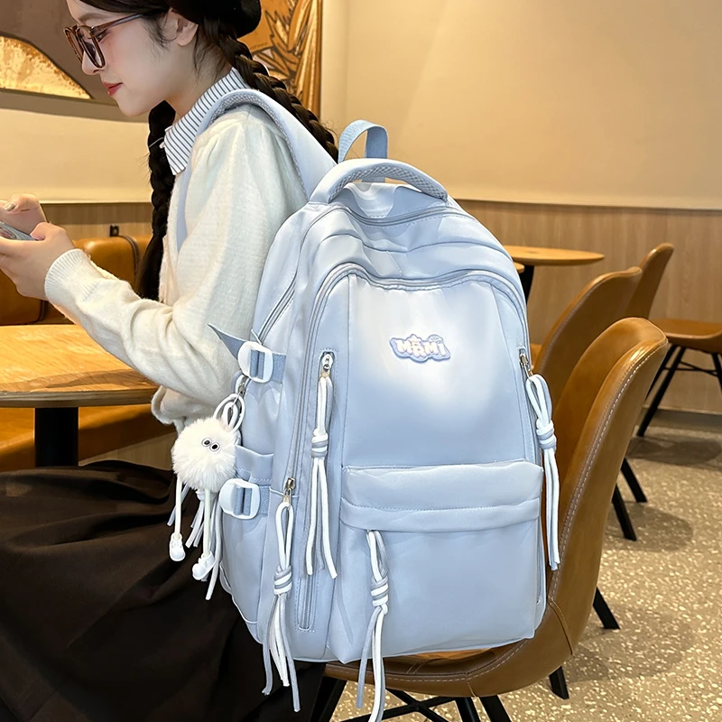 书包女初中女生2025新款大容量小学生中学生高中生减负轻便双肩包