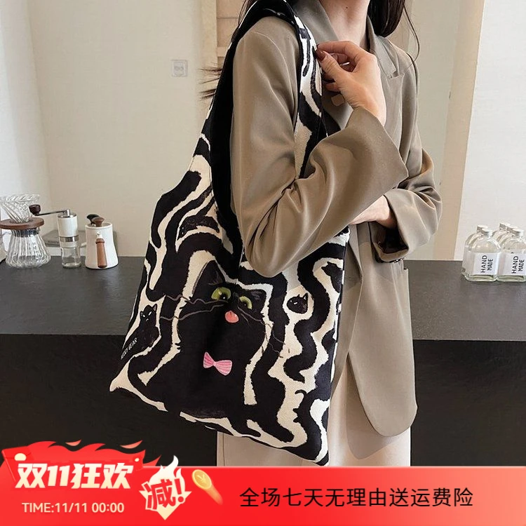 【万达撤柜】2024新小猫黑色慵懒通勤上班大容量帆布包单肩袋松弛设