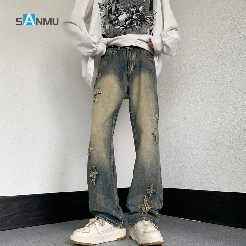 春季新款水洗做旧牛仔裤男女款美式直筒微喇复古十字架刺绣休闲裤