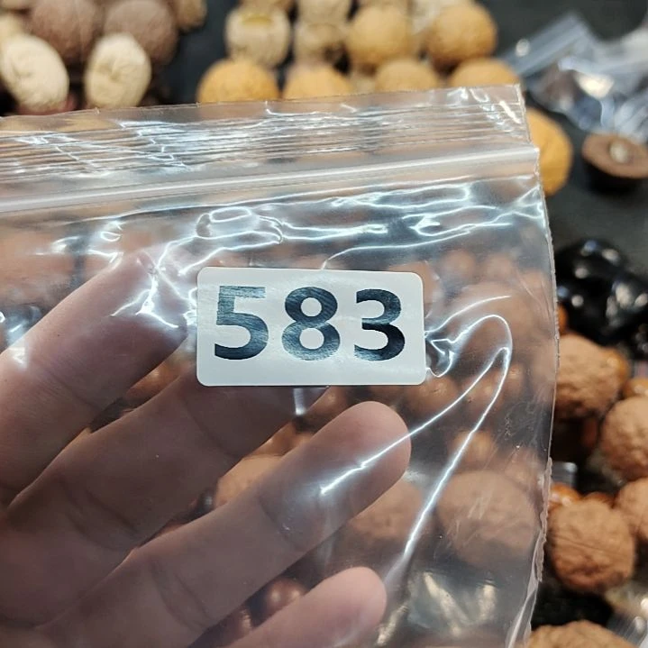 橄榄核吊坠源****]文玩核桃
